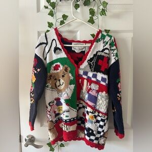This is the vintage 1995 Teddycare hand knit sweater!!